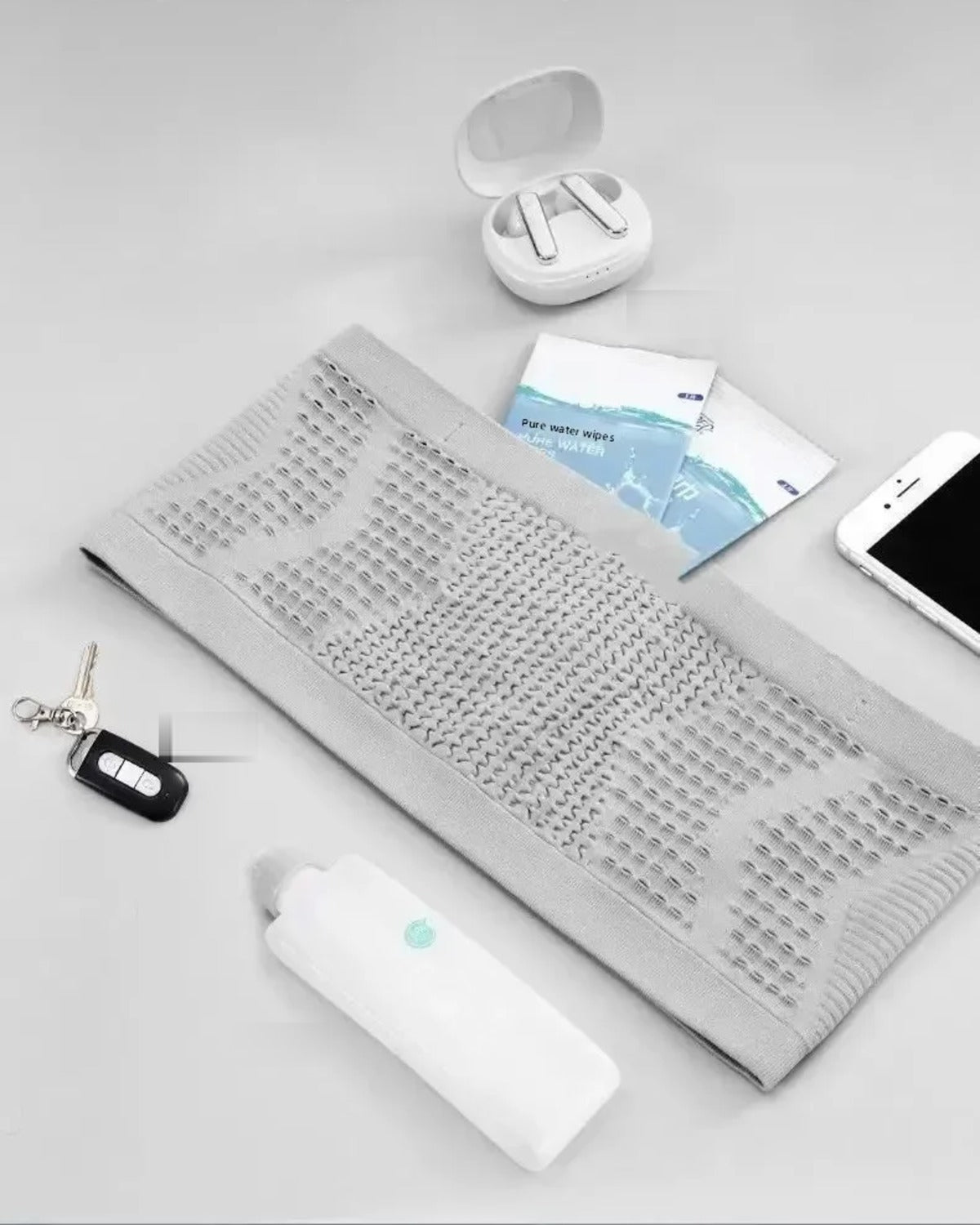 What fits inside: phone, keys, earbuds, flask