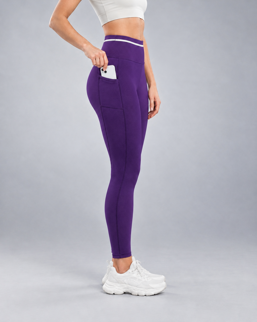 Women's Pro Winter Running Tight in Royal Purple, Side thigh pocket holding a phone