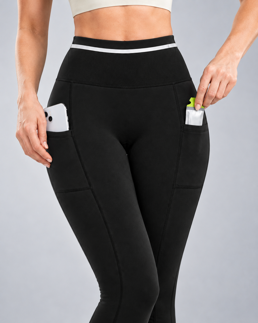 Women's Pro Winter Running Tight in Black, Side pockets in use