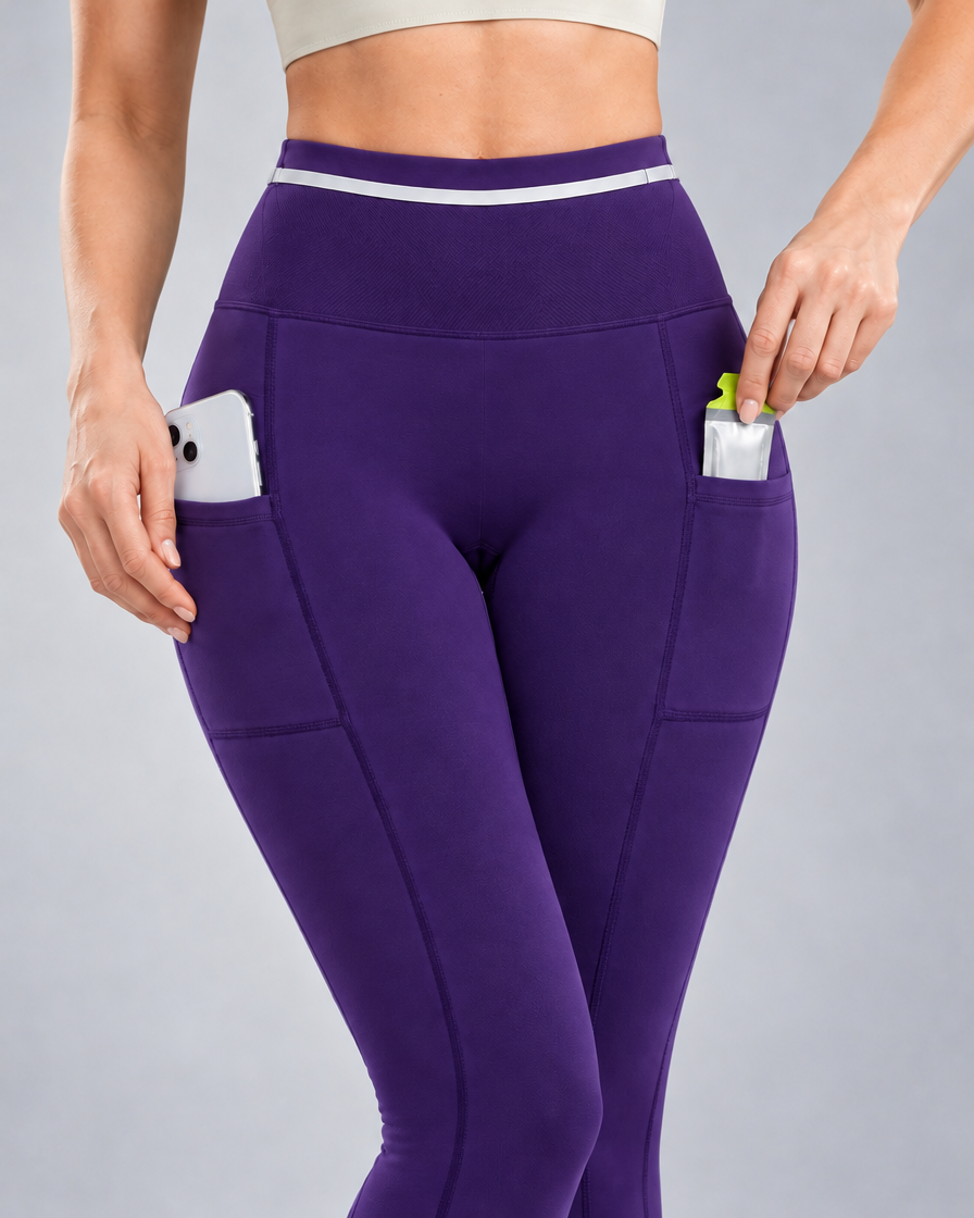 Women's Pro Winter Running Tight in Royal Purple, Side pockets in use