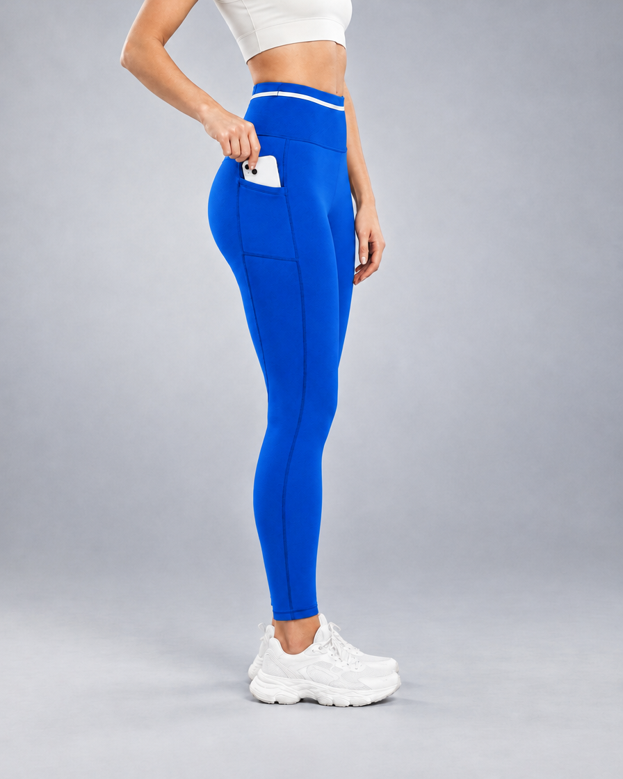 Women's Pro Winter Running Tight in Cobalt Blue, Side thigh pocket holding a phone