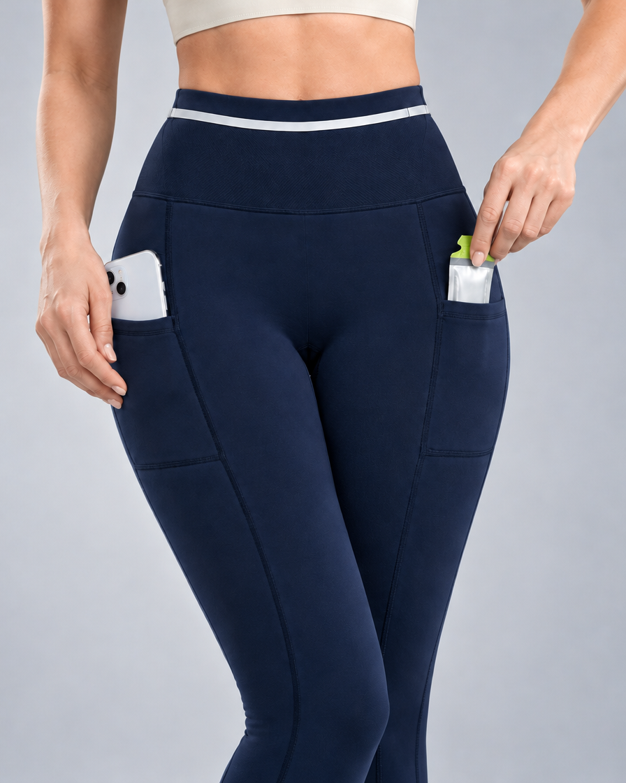 Women's Pro Winter Running Tight in Navy, Side pockets in use
